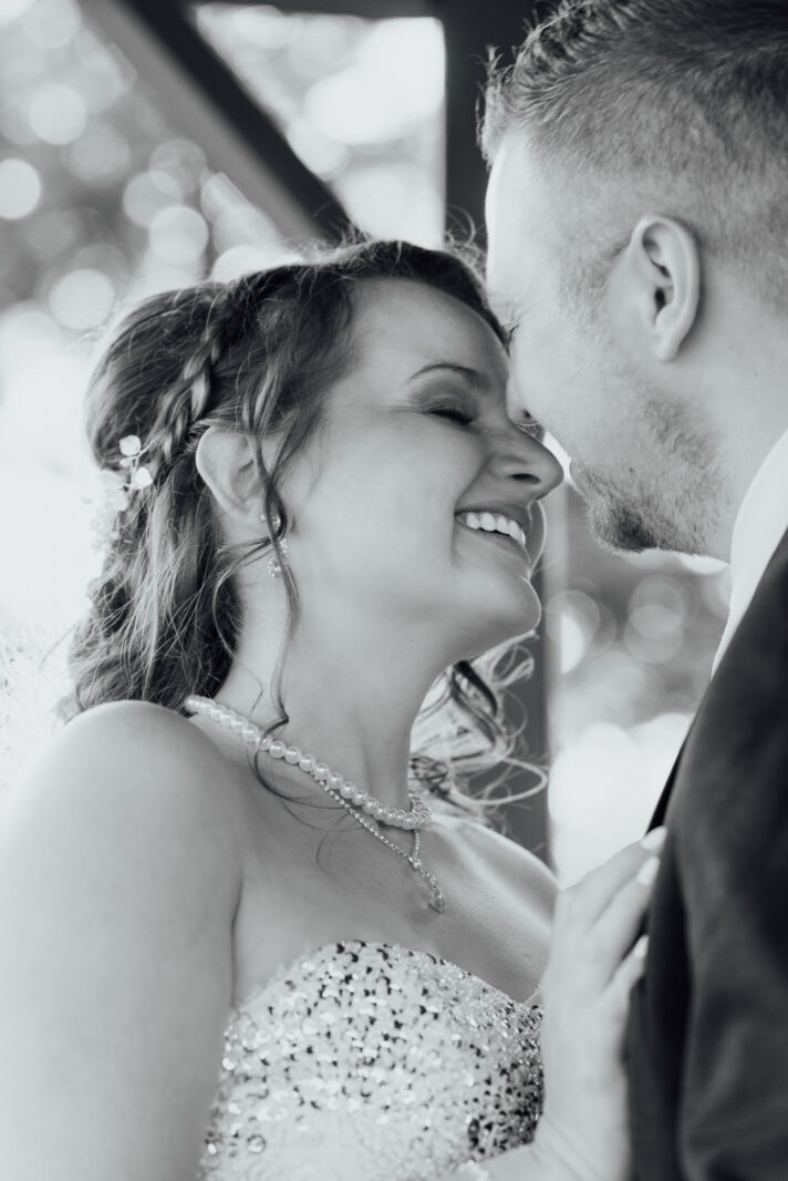 a man and woman smiling